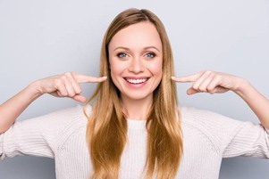 woman pointing smile